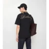 Bawełniany T-shirt z kursywnym logo w kratkę Bawełniany T-shirt z kursywnym logo w kratkę