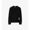 Sweter wełniany z etykietą w kratę Sweter wełniany z etykietą w kratę