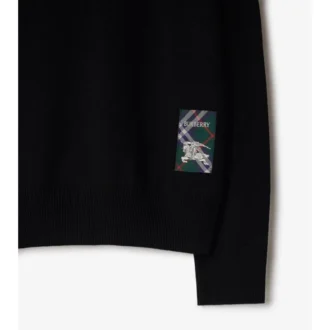 Sweter wełniany z etykietą w kratę