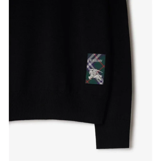 Sweter wełniany z etykietą w kratę Sweter wełniany z etykietą w kratę