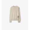 Sweter z wełny z metką