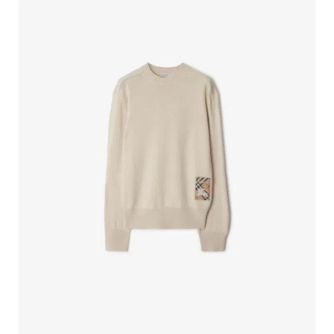 Sweter z wełny z metką