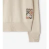 Sweter z wełny z metką