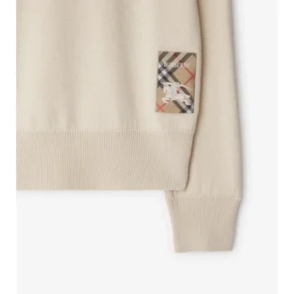 Sweter z wełny z metką